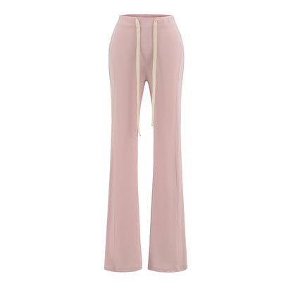 Pantalón de tiro bajo, ajustado, ligeramente acampanado