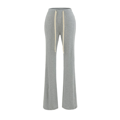 Pantalón de tiro bajo, ajustado, ligeramente acampanado