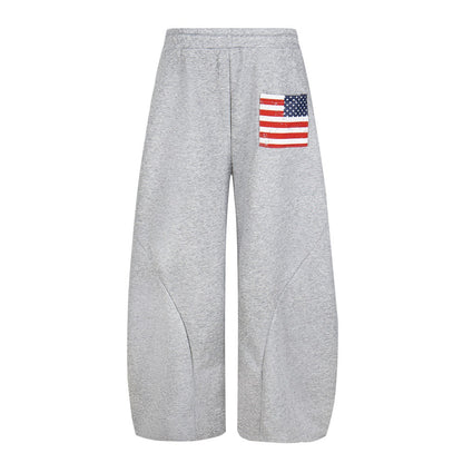 Pantalones deportivos bordados con tela adhesiva