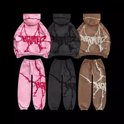 Sudadera con capucha de tres colores estampada con espuma de felpa