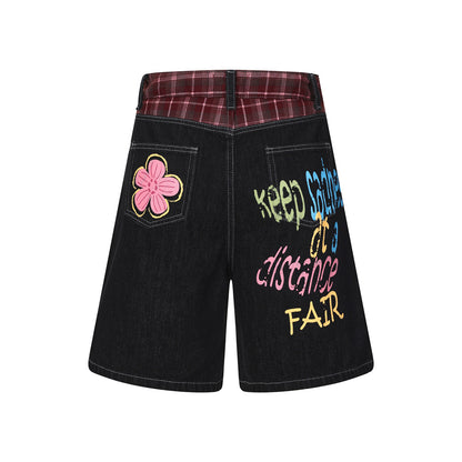 Pantalones cortos vaqueros estampados con grafitis de letras