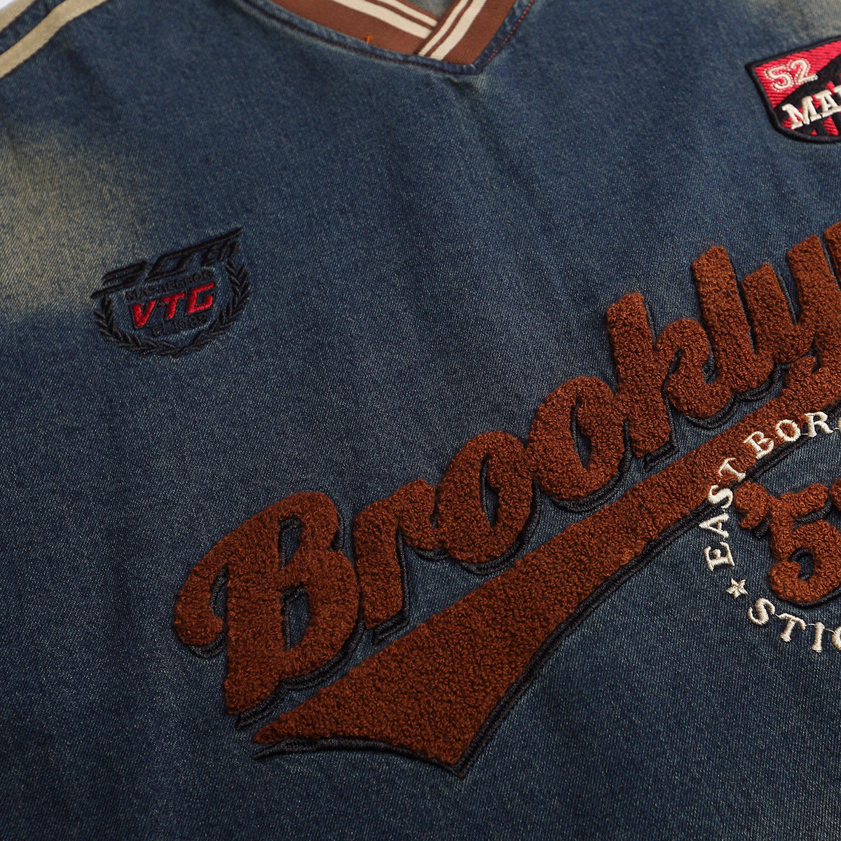 Embroidered washed denim hoodie