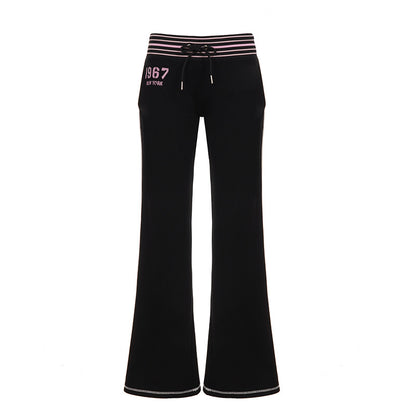 Pantalones holgados de rayas con cordón, cintura baja, pernera ancha y estilo tapered