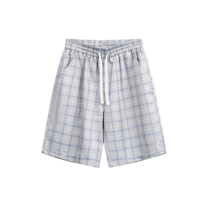 Pantalones cortos de cuadros holgados e informales estilo playero