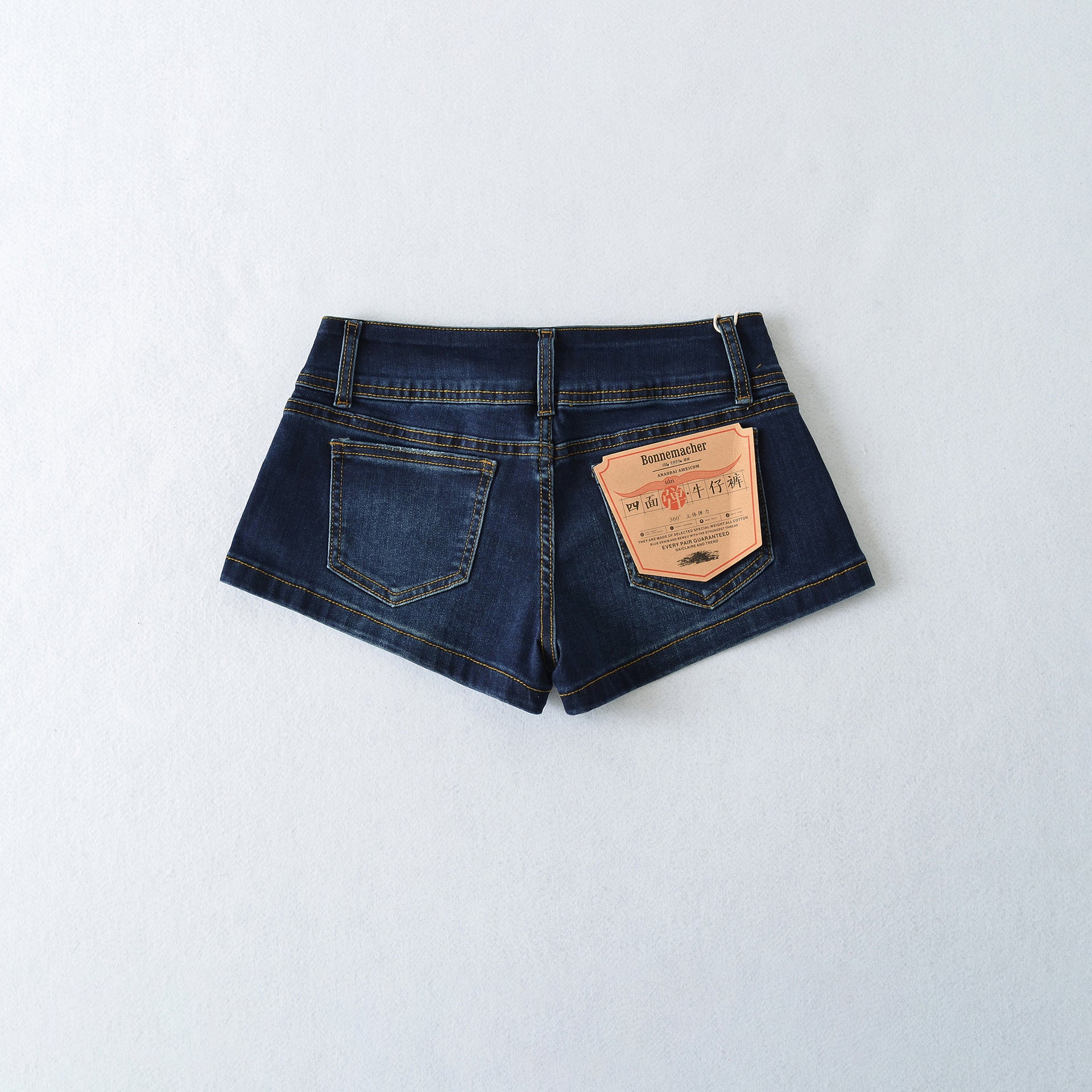 Low waisted two button denim shorts