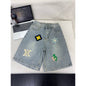 Shorts vaqueros con bordado floral