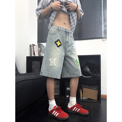 Shorts vaqueros con bordado floral