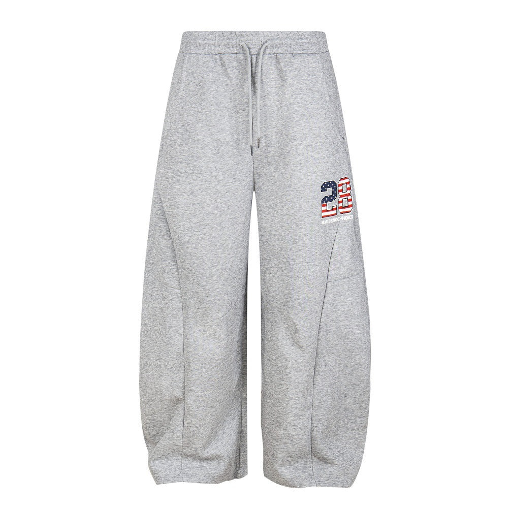Pantalones deportivos bordados con tejido adhesivo