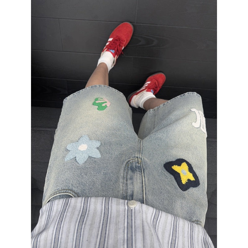 Shorts vaqueros con bordado floral