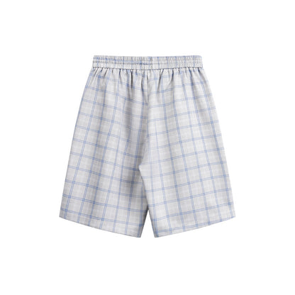 Pantalones cortos de cuadros holgados e informales estilo playero